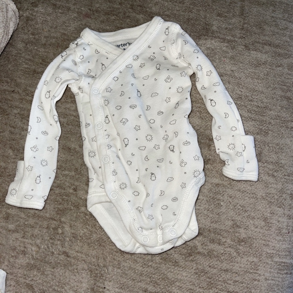 Newborn long sleeve bodysuit.